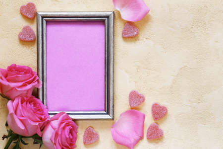 Pink rose flowers, frame for text and hearts for Valentines holidayの写真素材