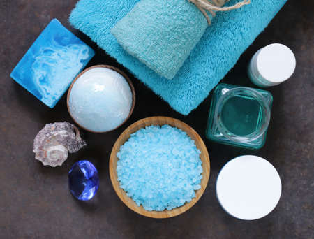 Spa concept turquoise - soap, salt, cream, towelの写真素材