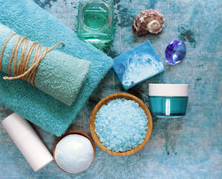 Spa concept turquoise - soap, salt, cream, towelの写真素材