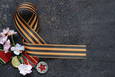 Victory Day ribbon and spring flowers holiday symbolsの写真素材