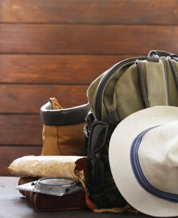 travel concept - backpack, compass, map and accessoriesの写真素材