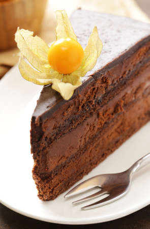 Dessert super chocolate cake on a white plateの写真素材