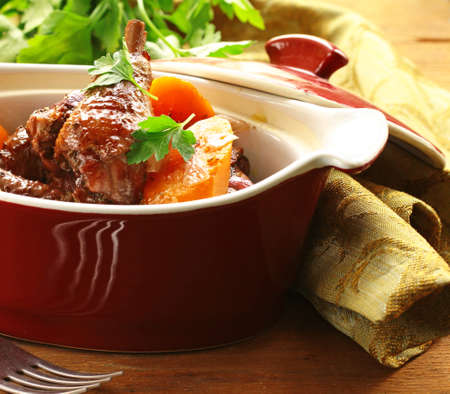 slow stew the cock in red wine with vegetablesの写真素材