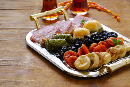 Oriental sweets  (baklava, rahat loachum) and dried fruitsの写真素材