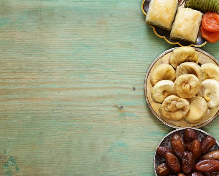 Oriental sweets  (baklava, rahat loachum) and dried fruitsの写真素材