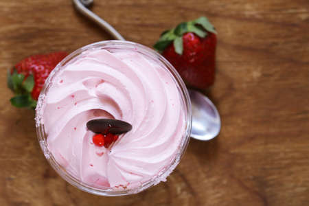 Creamy dessert in a glass of summer sweetnessの写真素材