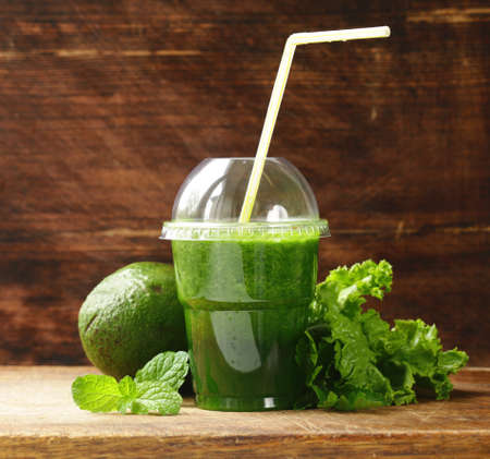Fresh green organic smoothie from avocadoの写真素材