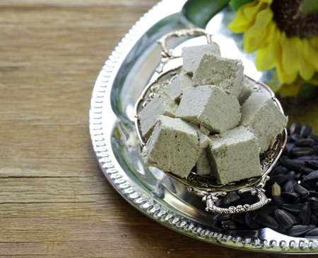 Oriental sweets halva from sunflower seeds with honeyの写真素材