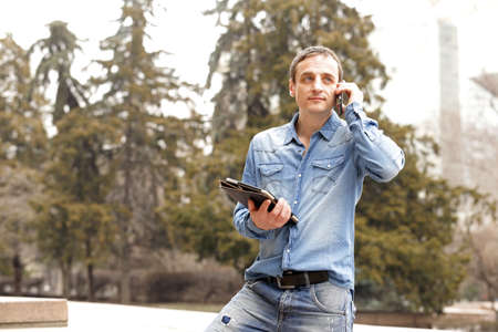 Portrait of a handsome adult man in casual clothes