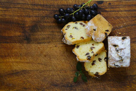 Pound cake with raisins and powdered sugarの写真素材