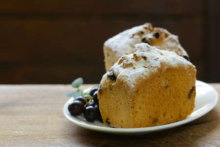 Pound cake with raisins and powdered sugarの写真素材