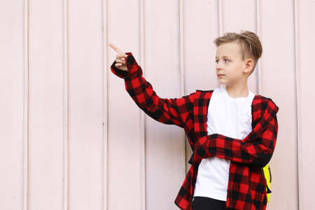 Portrait of a blonde boy casual style, fashionable haircutの写真素材