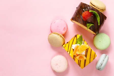 Assorted mini cakes sweet dessert, chocolate and fruitの写真素材