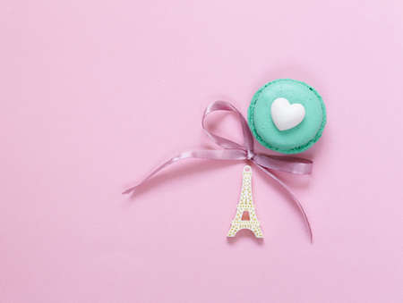 Traditional French macaroons almond cookies composition on a pink backgroundの写真素材