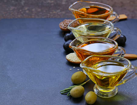 various types of vegetable oil - sesame, olive, linseed and grape seeds