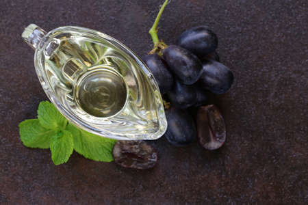 grape seed oil in a glass sauce vesselの写真素材