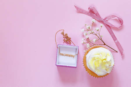 Happy Mothers Day! Dessert cupcakes and gift on holiday for momの写真素材
