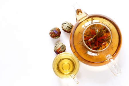 green tea flower (celestial lily) in a glass teapotの写真素材