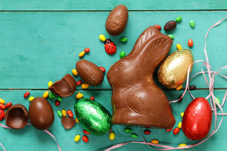 Funny easter composition with chocolate eggs