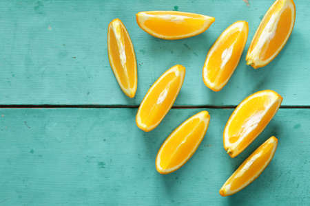 ripe organic orange sliced into slices