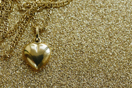 pendant gold heart - a gift for the holidayの写真素材