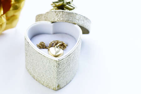 pendant gold heart - a gift for the holidayの写真素材