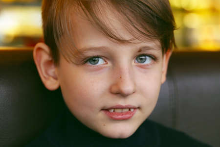 portrait of a cute blond boy