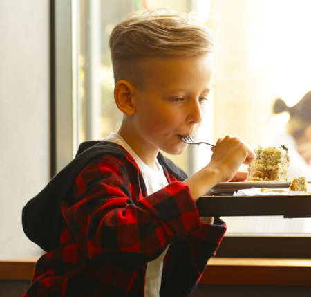 portrait of a cute blond boyの写真素材