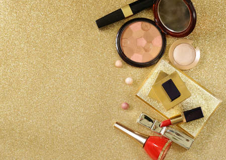 set cosmetics for makeup - brushes and eye shadows, lipstick and nail polishの写真素材