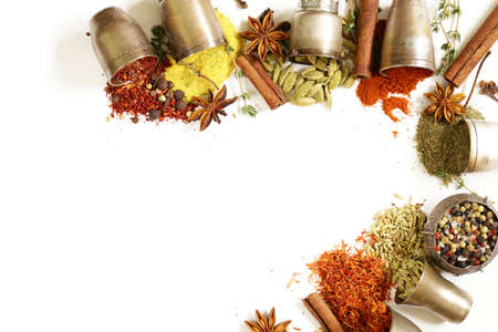 various aromatic spices in metal vintage bowls