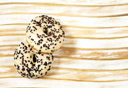 sweet donuts with sugar and chocolate glazeの写真素材