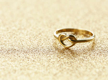 gold heart shaped ring for St. Valentines Day holidayの写真素材
