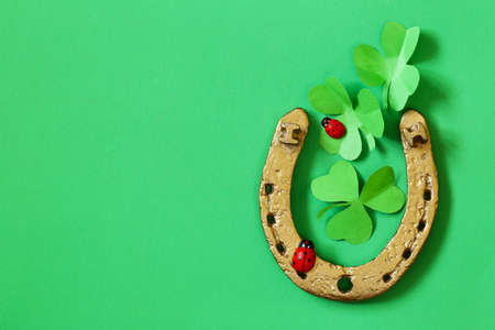 golden horseshoe symbol of good luck for a holiday St. Patrick's Dayの写真素材