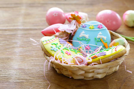 Easter cookies with colorful icing for treats for the holidayの写真素材