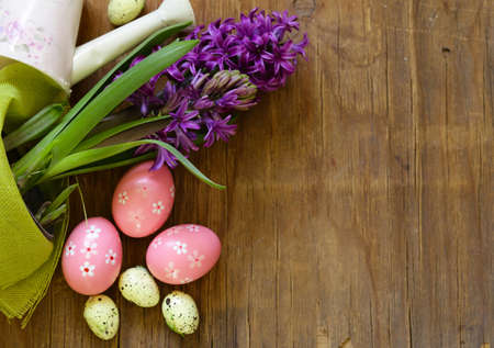 Easter still life - spring flowers hyacinths and painted eggsの写真素材