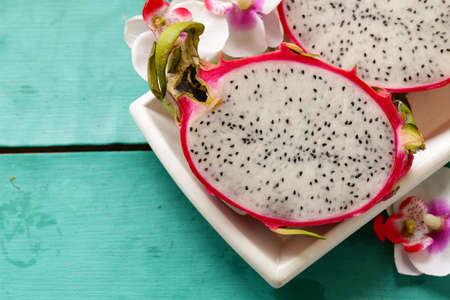 fresh tropical fruit dragon eyes on a wooden tableの写真素材