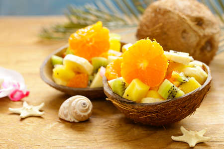 fruit salad of tropical fruits - mango, banana, kiwiの写真素材