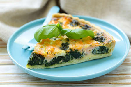French quiches pie with broccoli and salmon