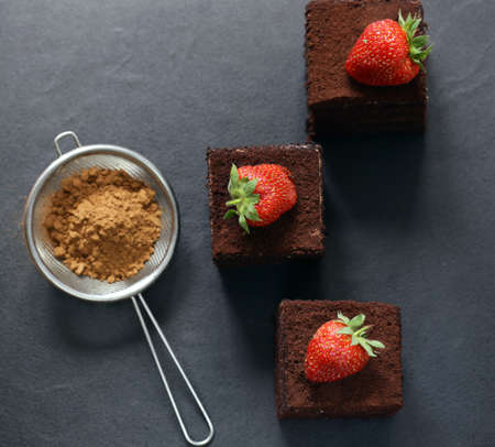 super chocolate truffle cake with fresh berriesの写真素材