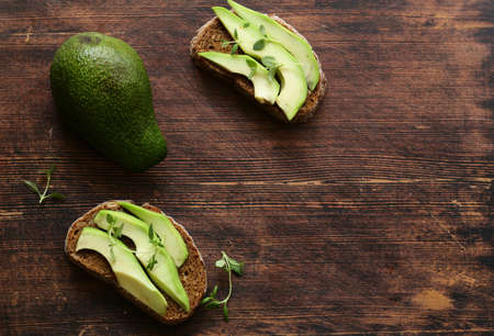 healthy food avocado sandwich and fragrant herbs