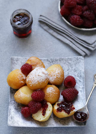 cottage cheese donuts balls with powdered sugarの写真素材