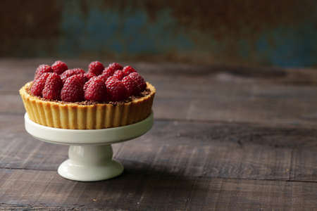 homemade pie tart with fresh raspberries