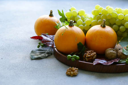 autumn still life with fruits and pumpkins