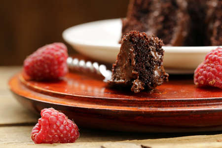 piece of super chocolate cake on a plateの写真素材