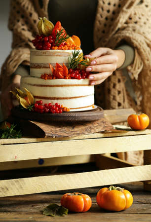 festive cake with autumn decor for thanksgiving dayの写真素材