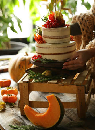 festive cake with autumn decor for thanksgiving dayの写真素材