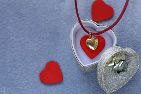 gold heart pendant gift for Valentine's Dayの写真素材