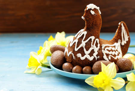 festive baking cake decorated eggs for Easterの写真素材