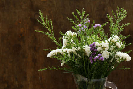 autumn flowers still life on a wooden backgroundの写真素材