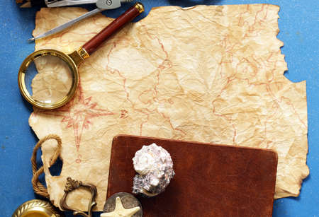 Vintage map, compass, magnifier - adventure and treasure hunt